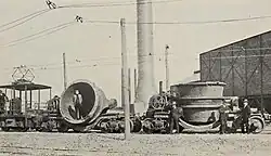 Electric 'motor' with pantograph, and two 25 ton slag ladle wagons (c.1911)