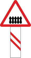 Guarded railway crossing (200 metres ahead)