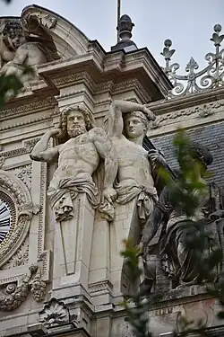 Baroque Revival atlantes of the Palais de la Bourse, Lyon, France, designed by René Dardel and sculpted by Jean-Marie Bonnassieux, 1854-1860