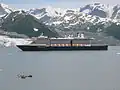 Holland America Line's MS&nbsp;Oosterdam passing Turner Glacier while leaving Disenchantment Bay