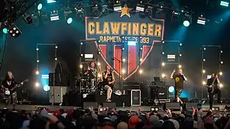 Clawfinger performing in 2024.