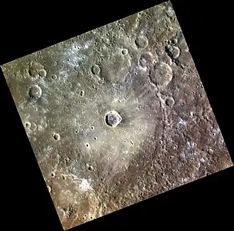 Exaggerated color view of Hafiz crater with unnamed dark crater near center