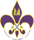 The Hammurabi Assyrian Scout Association emblem incorporates elements of the Assyrian flag as well as the upper part of the stele of the Code of Hammurabi