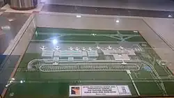 Model showing the Detailed Engineering Design (DED) of Terminal 1 (brown roof) and Terminal 2 (blue roof)