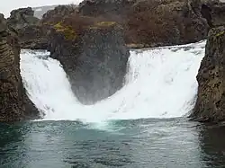The waters of Fossá merging in the basin of Hjálparfoss.