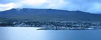 Akureyri with Hlíðarfjall in the background.