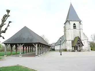 The church and covered market in Hornoy-le-Bourg