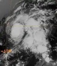 A satellite image depicting a small hurricane in the Eastern Pacific Ocean