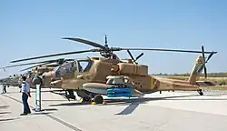 A AH-64A Apache Peten attack helicopter of 190 Squadron "Magic Touch" at an exhibition in 2017