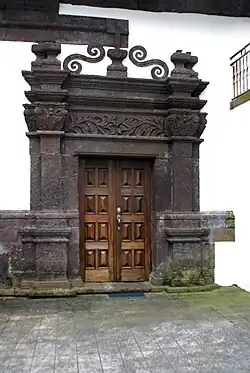 The lateral doorway in sculpted basalt