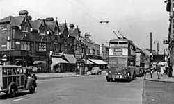 Two west-bound trolleybuses in Romford Road, Ilford, in July 1955.