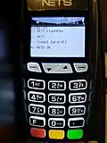 NETS menu displayed on an Ingenico iCT250 payment terminal