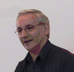 Head shot of a man wearing spectacles
