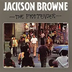 Album cover showing Jackson Browne in a white t-shirt and tan pants crossing a city street