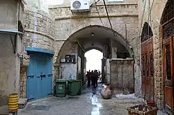 Covered alleyway, once a narrow opening in the wall used by pedestrians. Now Rivka and Shlomo Abulafia Streets