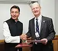 Jitin Prasada and the Minister of Universities and Science, UK, Mr. David Willetts, exchanging the signed documents of the Indo-UK MoU on HRD, in New Delhi on February 20, 2013.