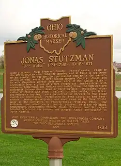 This marker commemorates the first European settler in this township.