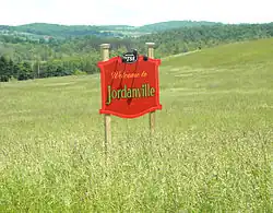 Settlement sign for Jordanville