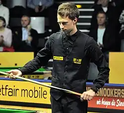 Judd Trump waiting to take a shot