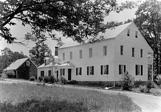 Back of Rockingham c. 1910 with stone outer house still in place before the move