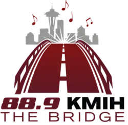 Maroon bridge, with the skyline of Seattle in the background under musical notes and reading "88.9 KMIH The Bridge"