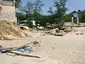 Destroyed beach access (about 2 meters of sand were washed away, leaving the access hanging in the air).