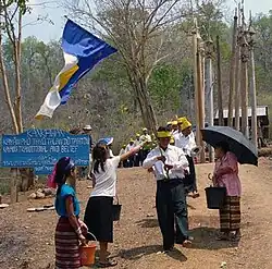 Following the pwai dance, the women sprinkle the men with water using Eugenia leaves.