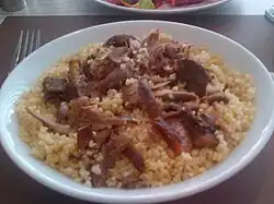 Kaz tiridi, a Turkish specialty of goose meat served over bulgur