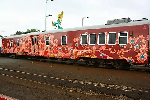 Kereta Api Indonesia's special dining car, M1 0 86 01 with Maduranese batik special paint scheme. It was modified in mid 2010-s from a 1986 built 3rd class car.