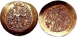 Coin in the name of Kidara, with legend "βαγο Κιδαρο οοζορκο κοþανοþαο" "Kidara, the great Kushanshah". Type 6A-D. Coin type found in Tepe Maranjan, dated to before 388 CE.[8]