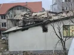 Image of the collapsed roof of the burnt-out nightclub.