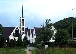 The Church of St. Stanislaus Kostka, with the Oliwa forests in the background