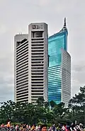Wisma 46 (right) next to the BNI headquarters building (left)