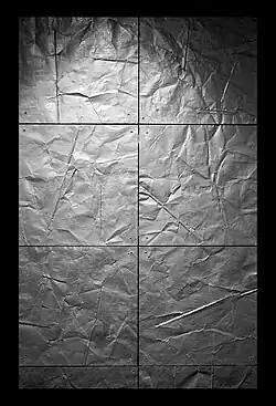 Close up view of the floor tiles made from FARC firearms