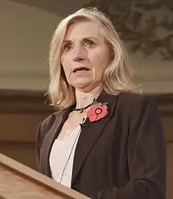 Photo of Anne Rafferty speaking at a lectern.