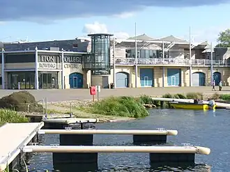Landing stages at the rowing centre with the building for the rowing centre in the background