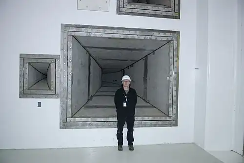 Larry Opper in front of one of the 25 Hz horns in the RATF