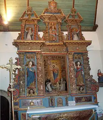The baroque "Rosary" altarpiece in the Église Sainte-Geneviève at Loqueffret