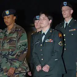 England after she was sentenced to three years for prisoner abuse at Abu Ghraib.