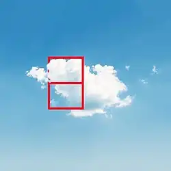 A cloud in the sky with a red glyph drawn on it