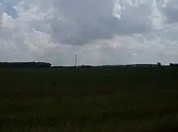 Madison Township contains wide farmlands interspersed with small woods.