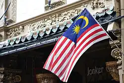 Malaysian flag flying on a pole