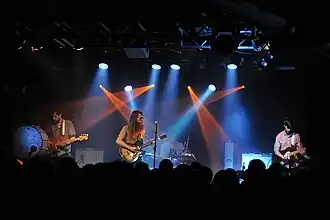 Maps & Atlases performing in 2012. Left to right: bassist Shiraz Dada, guitarist/vocalist Dave Davison, drummer Chris Hainey and former guitarist Erin Elders.