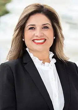 Headshot of Alvarado-Gil on a white background