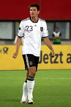Gómez on the field in a white Germany kit