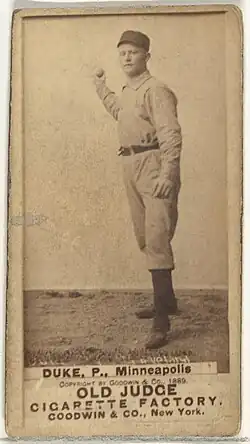 Standing man in baseball uniform