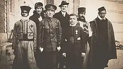 Crawford standing with patients during the First World War