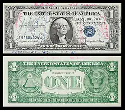 A 1957-A $1 Silver certificate short snorter flown in 1961 on Freedom 7 by Alan Shepard