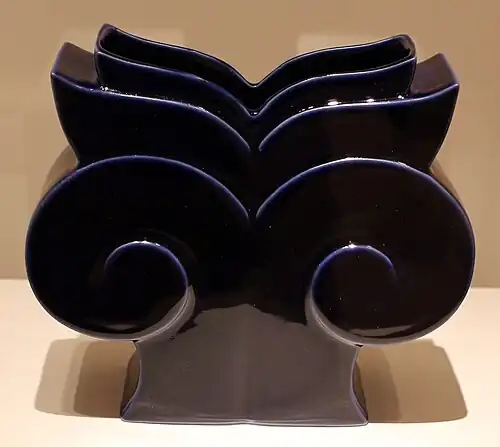 Postmodern vase inspired by the Ionic capital, designed by Michael Graves for Swid Powell, 1989, glazed porcelain, Indianapolis Museum of Art, Indianapolis, US[38]
