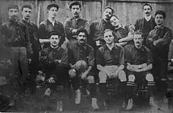 black and white team photo circa 1906